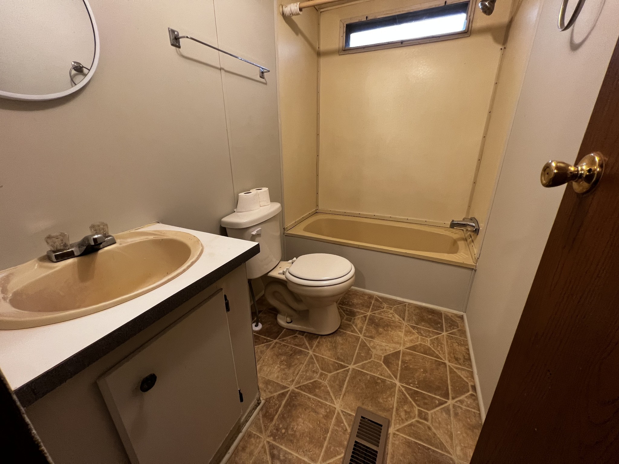 1244 Taylor Road Manchester, TN 37355 - Photo 12 of 14 a bathroom with a sink and a mirror