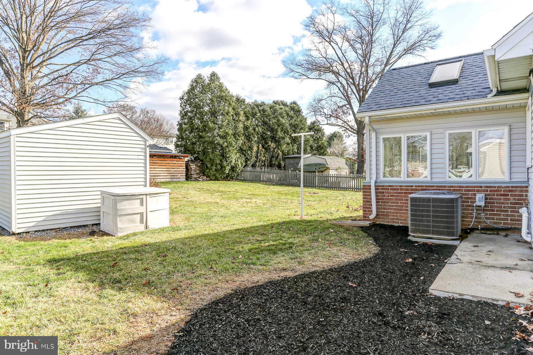 233 Cardinal Road Lititz, PA 17543 - Photo 23 of 26 a view of a house with backyard and a tree