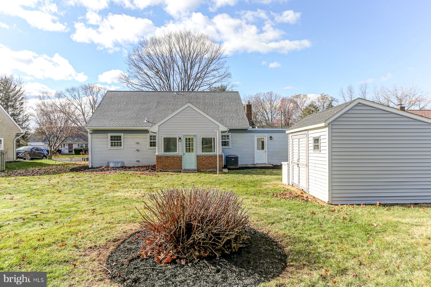 233 Cardinal Road Lititz, PA 17543 - Photo 24 of 26 a front view of a house with a yard