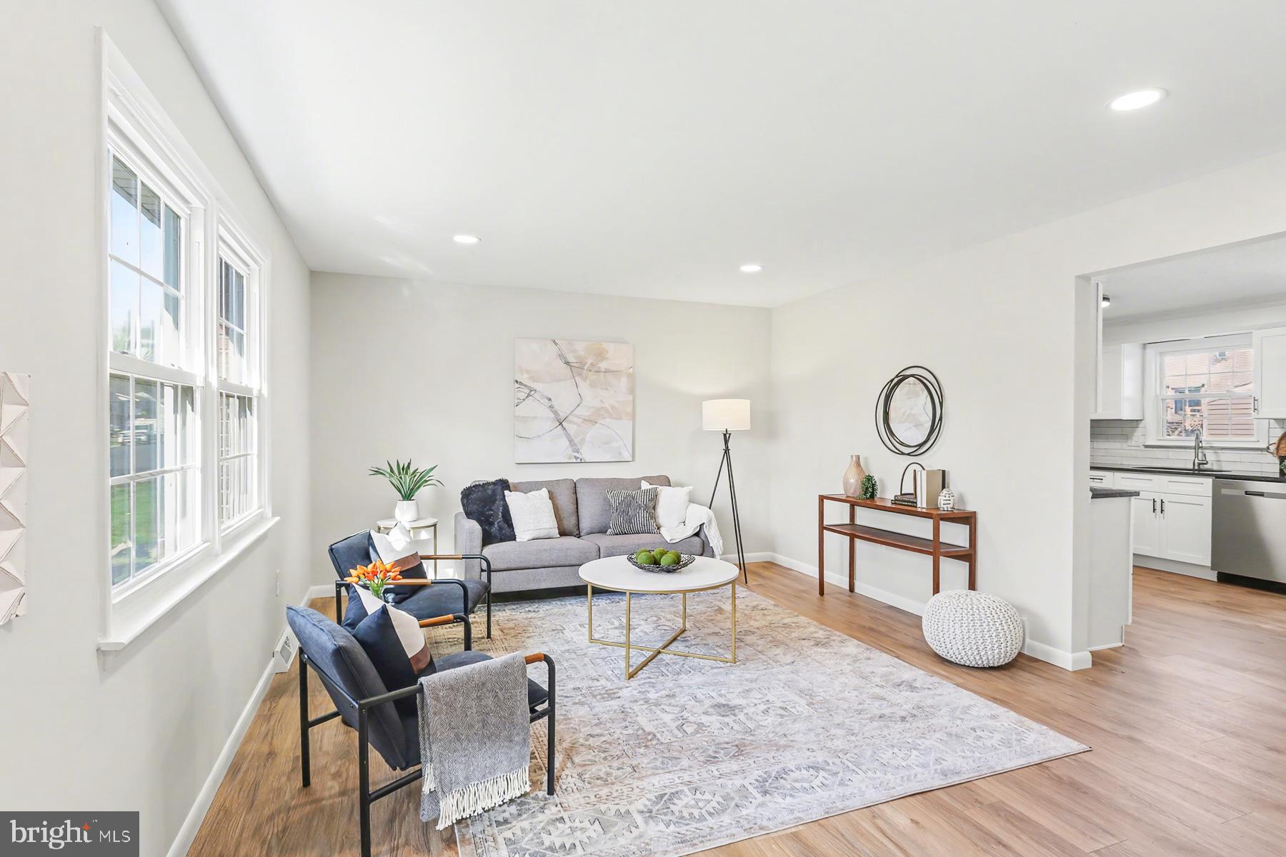 233 Cardinal Road Lititz, PA 17543 - Photo 4 of 26 a living room with furniture a rug and white walls