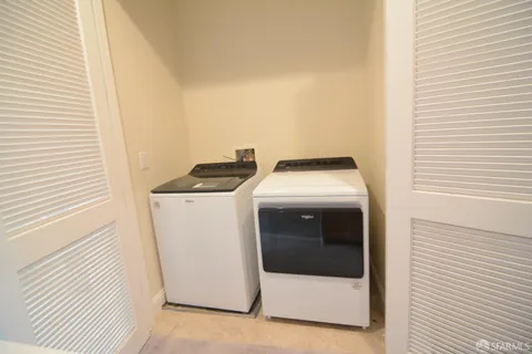 a bathroom with a sink double vanity and a mirror