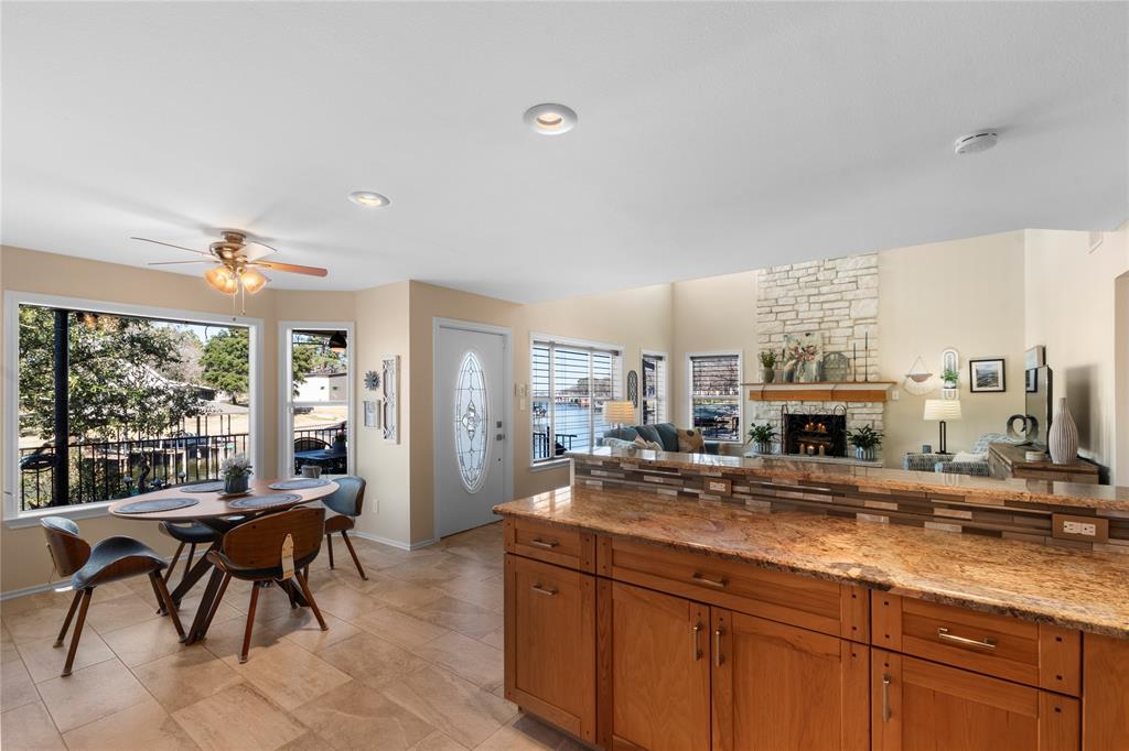 313 Sundown Trail Tool, TX 75143 - Photo 13 of 39 a kitchen with sink and view living room