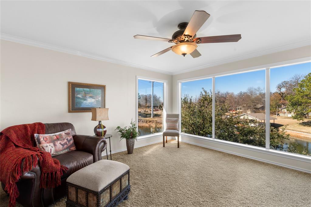 313 Sundown Trail Tool, TX 75143 - Photo 31 of 39 a living room with furniture a ceiling fan and a window