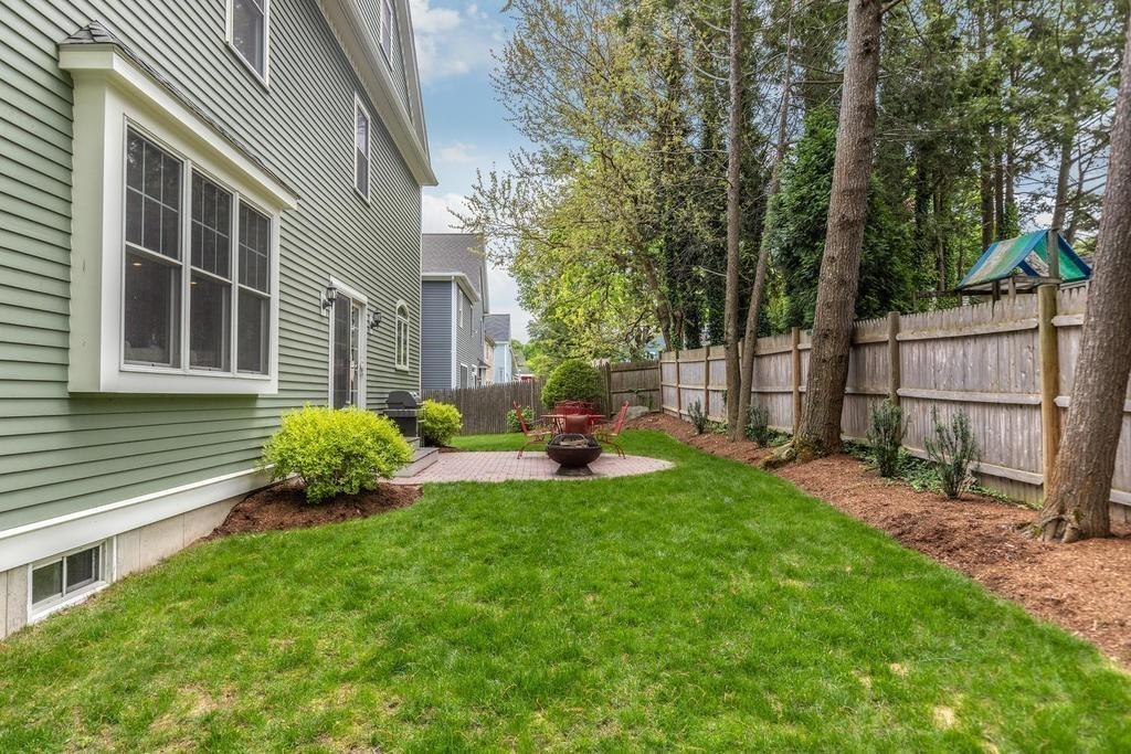9 Stimson Avenue Lexington, MA 02421 - Photo 24 of 30 a house view with a garden space