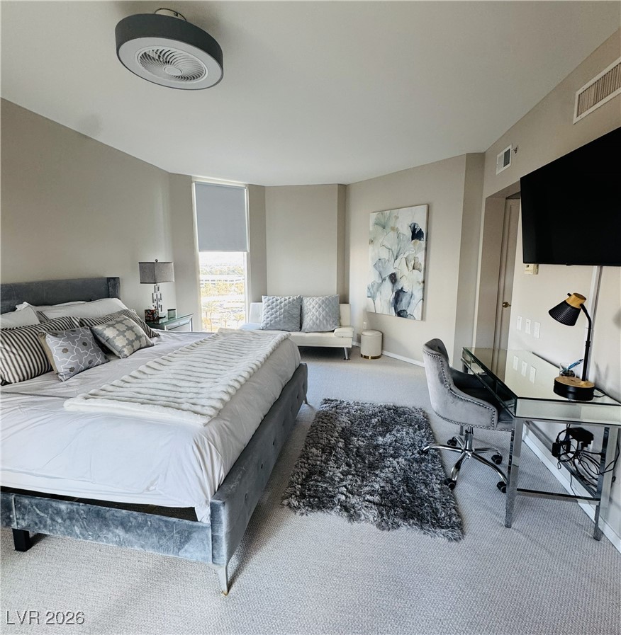 2857 Paradise Road, Unit 904 Las Vegas, NV 89109 - Photo 11 of 27 Bedroom with carpet and an office area