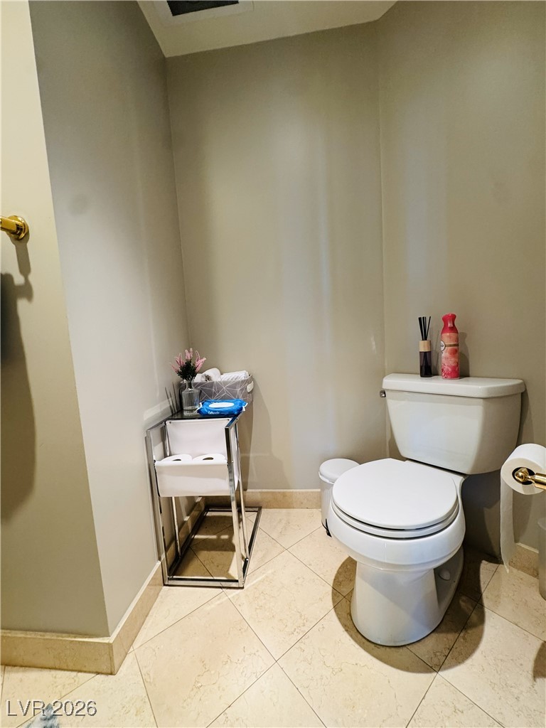2857 Paradise Road, Unit 904 Las Vegas, NV 89109 - Photo 19 of 27 Half bathroom with toilet and baseboards