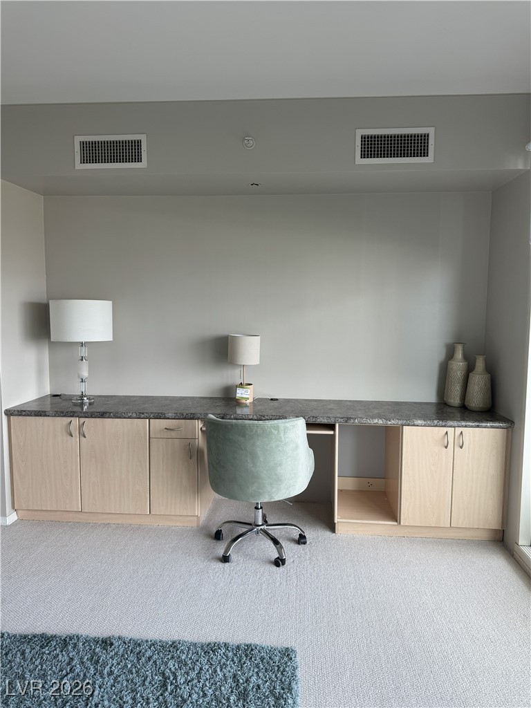 2857 Paradise Road, Unit 904 Las Vegas, NV 89109 - Photo 22 of 27 Carpeted office with built in desk