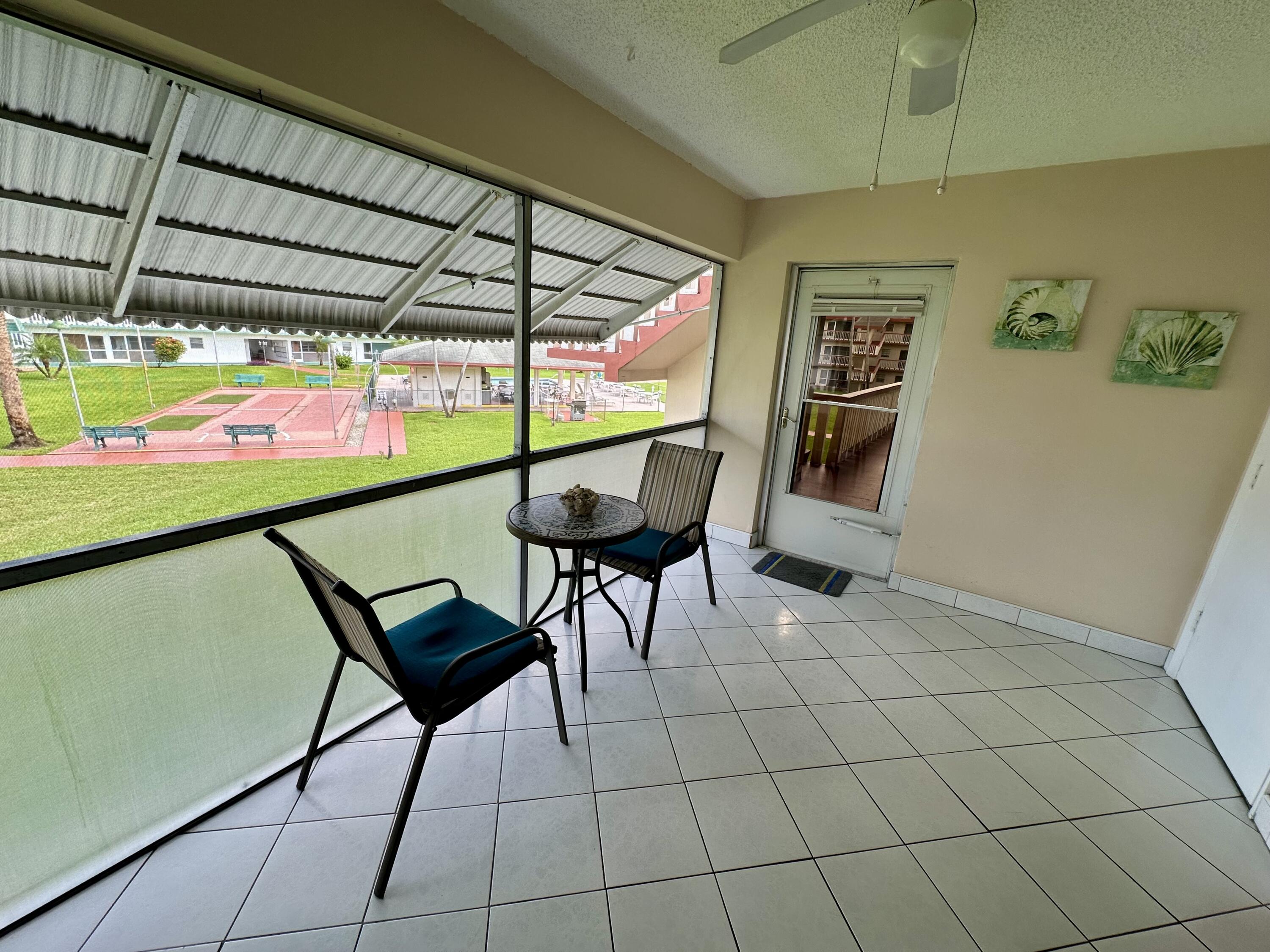 5300 Washington Street, Unit L240 Hollywood, FL 33021 - Photo 3 of 8 a view of chairs and table in a room