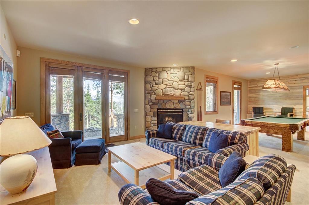 265 Mountain Bluebell Road Keystone, CO 80435 - Photo 12 of 35 a living room with furniture and a large window