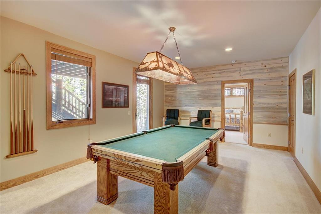 265 Mountain Bluebell Road Keystone, CO 80435 - Photo 18 of 35 a room with pool table and windows