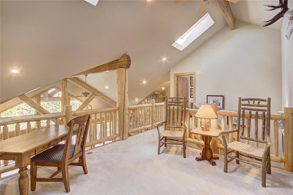 265 Mountain Bluebell Road Keystone, CO 80435 - Photo 21 of 35 a view of a livingroom with furniture and a wooden floor