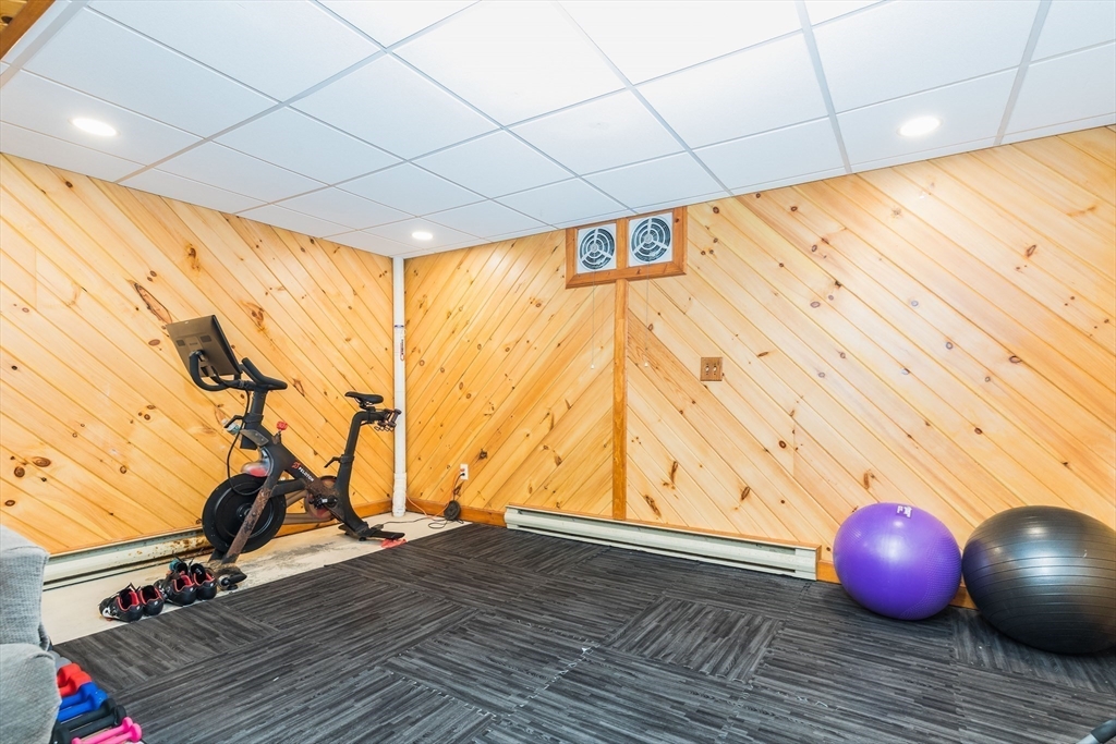 4 Acadia Kimball Road, Unit 4 Amesbury, MA 01913 - Photo 17 of 20 a room with wooden floor and pool table