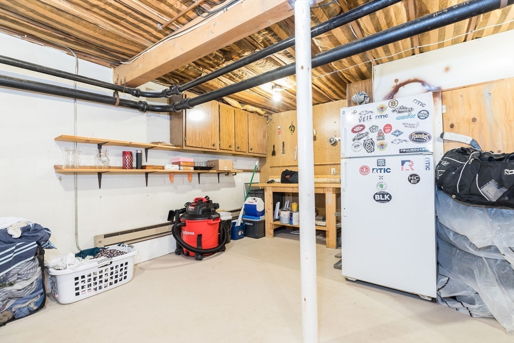 4 Acadia Kimball Road, Unit 4 Amesbury, MA 01913 - Photo 18 of 20 a utility room with storage