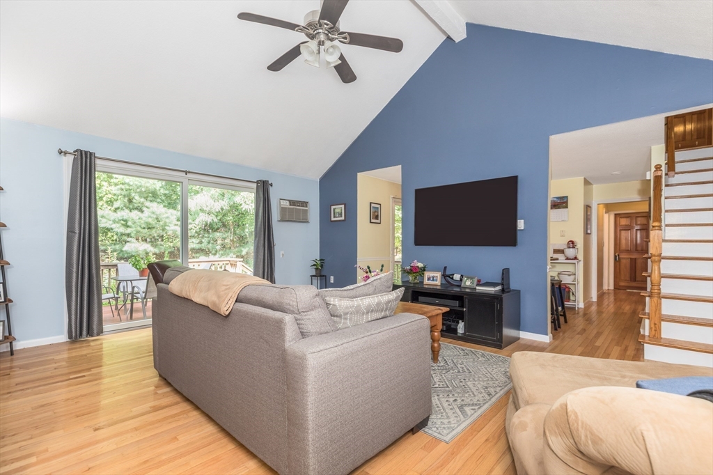 4 Acadia Kimball Road, Unit 4 Amesbury, MA 01913 - Photo 3 of 20 a living room with furniture and a flat screen tv