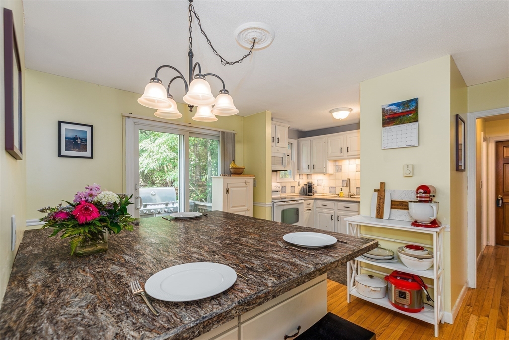4 Acadia Kimball Road, Unit 4 Amesbury, MA 01913 - Photo 5 of 20 a very nice looking dining room with a table and chairs in it