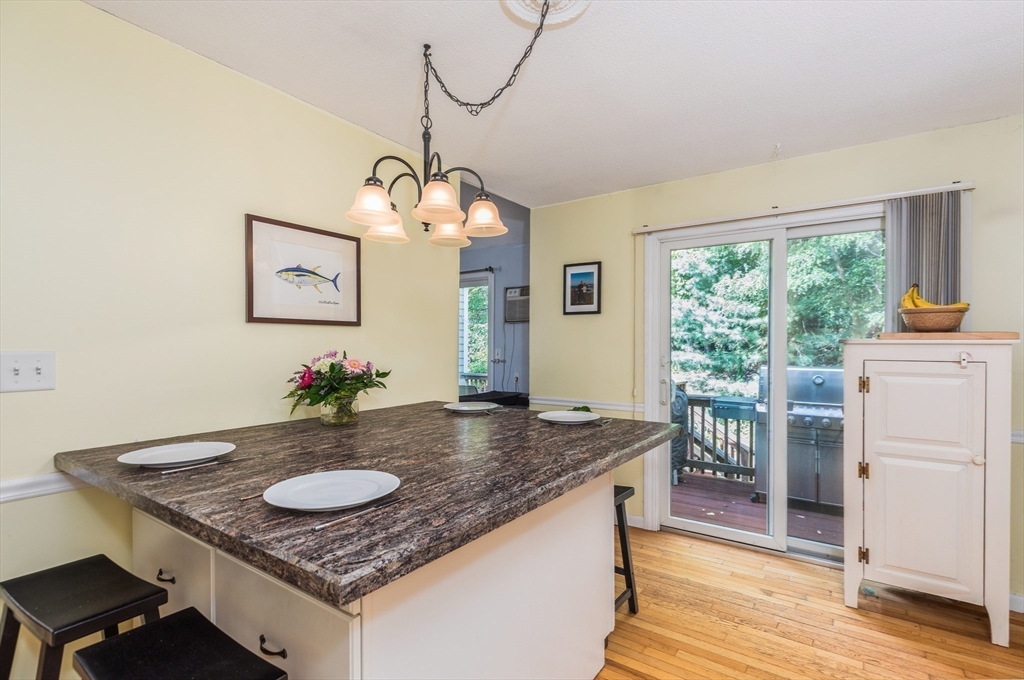 4 Acadia Kimball Road, Unit 4 Amesbury, MA 01913 - Photo 7 of 20 a view of a kitchen area