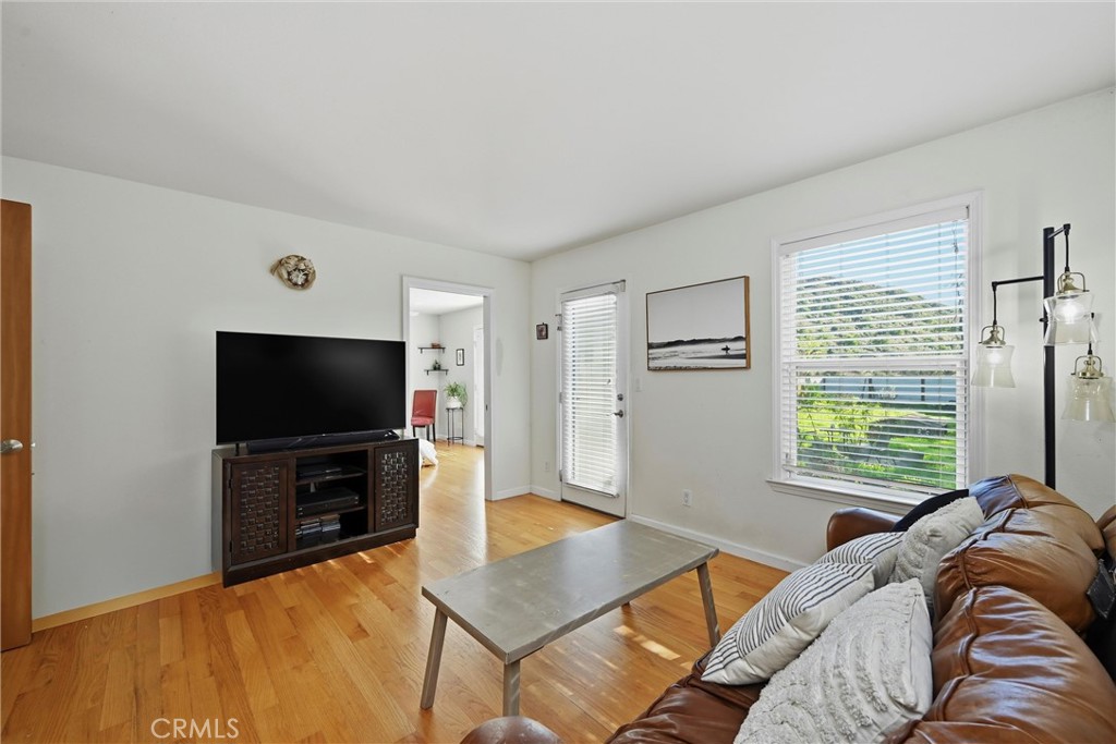 21264 Santa Clara Road Middletown, CA 95461 - Photo 17 of 39 a bedroom with a bed and a flat screen tv