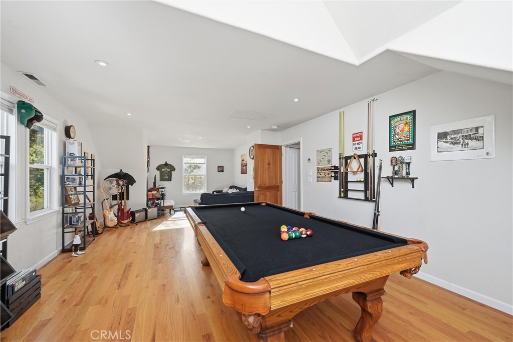 21264 Santa Clara Road Middletown, CA 95461 - Photo 25 of 39 a room with furniture pool table and wooden floor