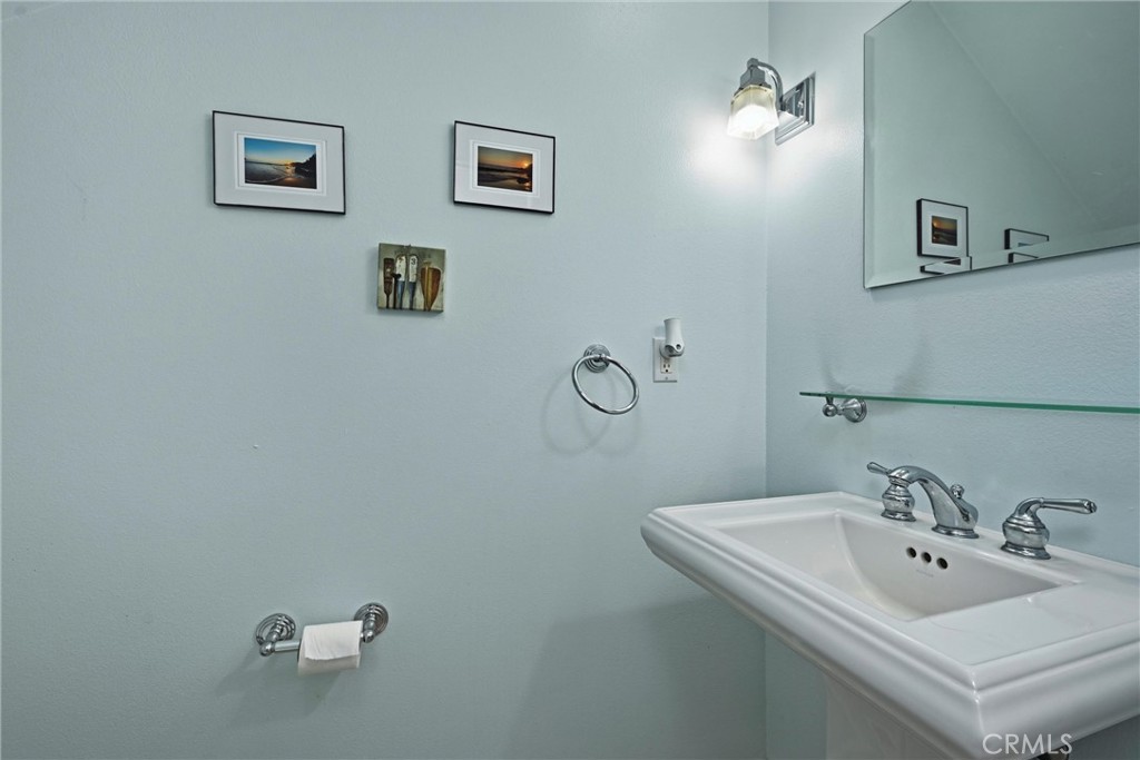 21264 Santa Clara Road Middletown, CA 95461 - Photo 27 of 39 a bathroom with a sink and mirror