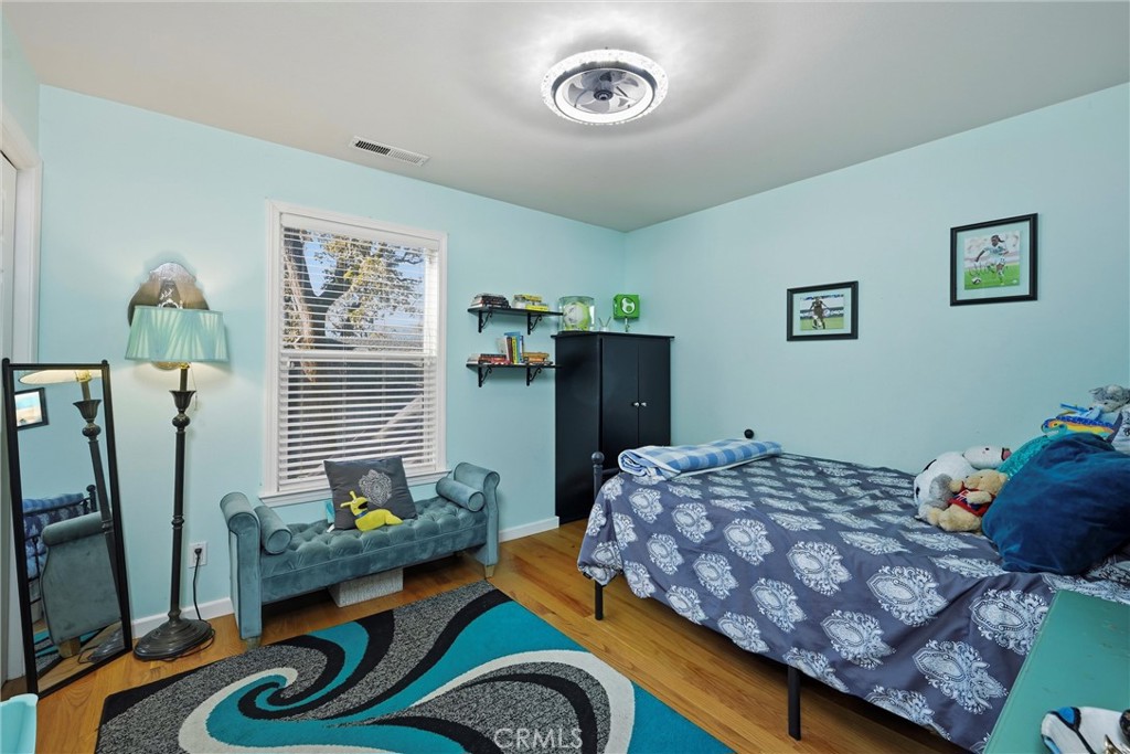 21264 Santa Clara Road Middletown, CA 95461 - Photo 28 of 39 a bedroom with bed and a window