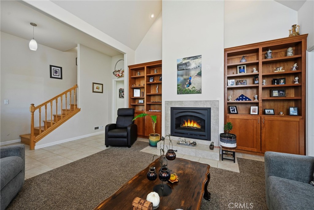 21264 Santa Clara Road Middletown, CA 95461 - Photo 5 of 39 a living room with furniture and a fireplace