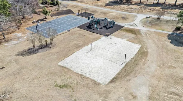 a view of a large building with a yard