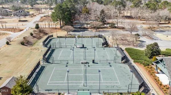 a view of a swimming pool with seating area