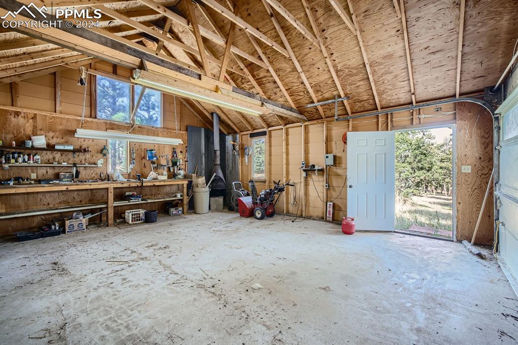 11330 Holmes Road Colorado Springs, CO 80908 - Photo 24 of 40 Garage with a workshop area