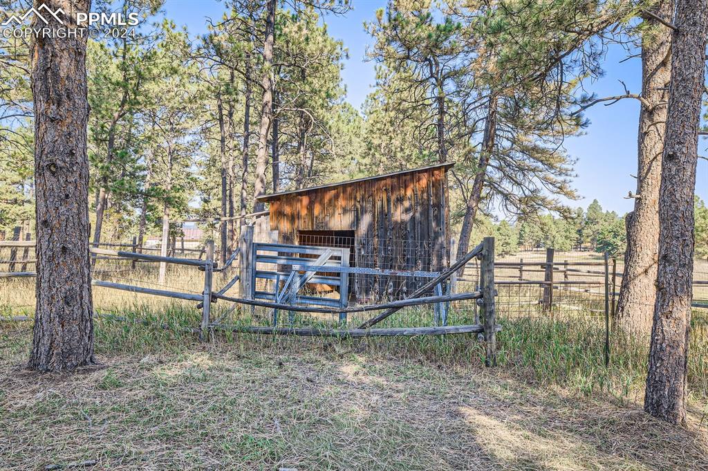 11330 Holmes Road Colorado Springs, CO 80908 - Photo 27 of 40 View of outdoor structure with a rural view
