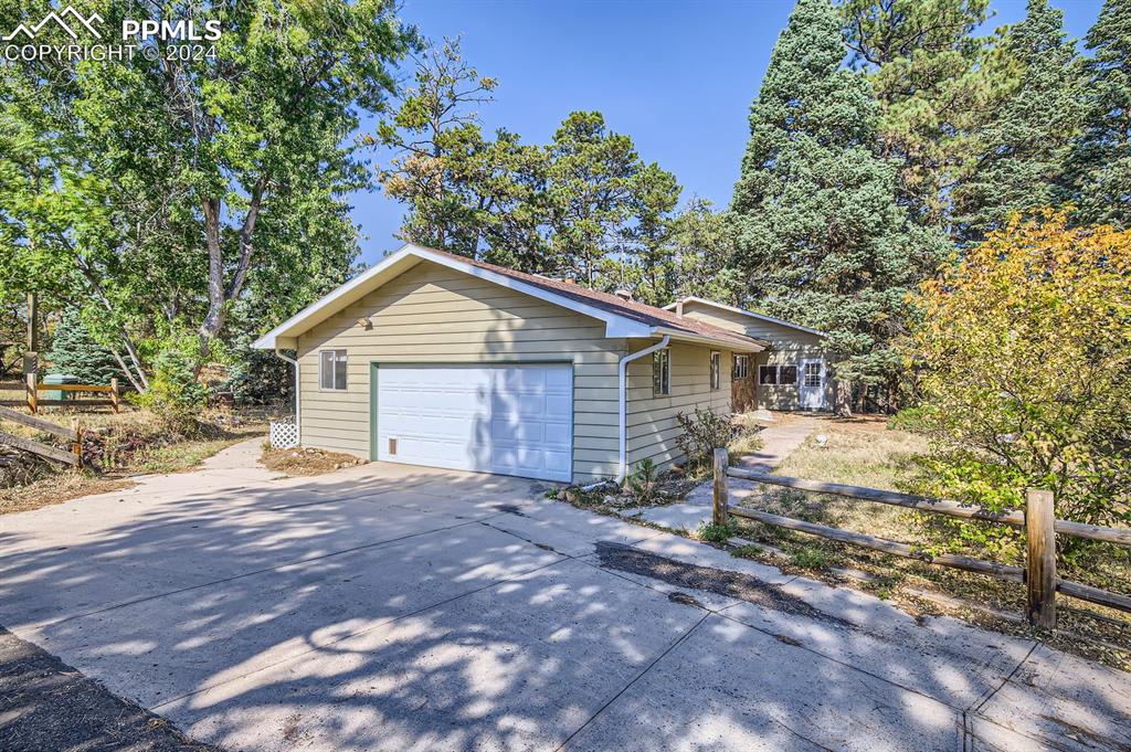 11330 Holmes Road Colorado Springs, CO 80908 - Photo 28 of 40 View of garage