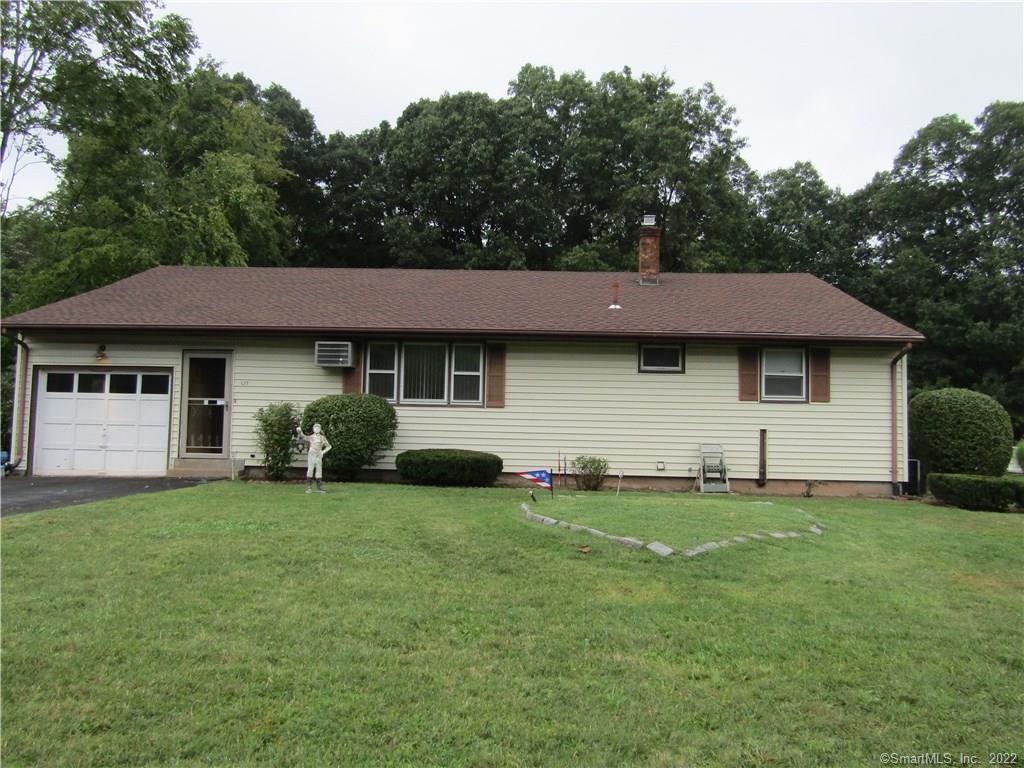 127 Ridgewood Road Wallingford, CT 06492 - Photo 1 of 1 a front view of a house with a garden
