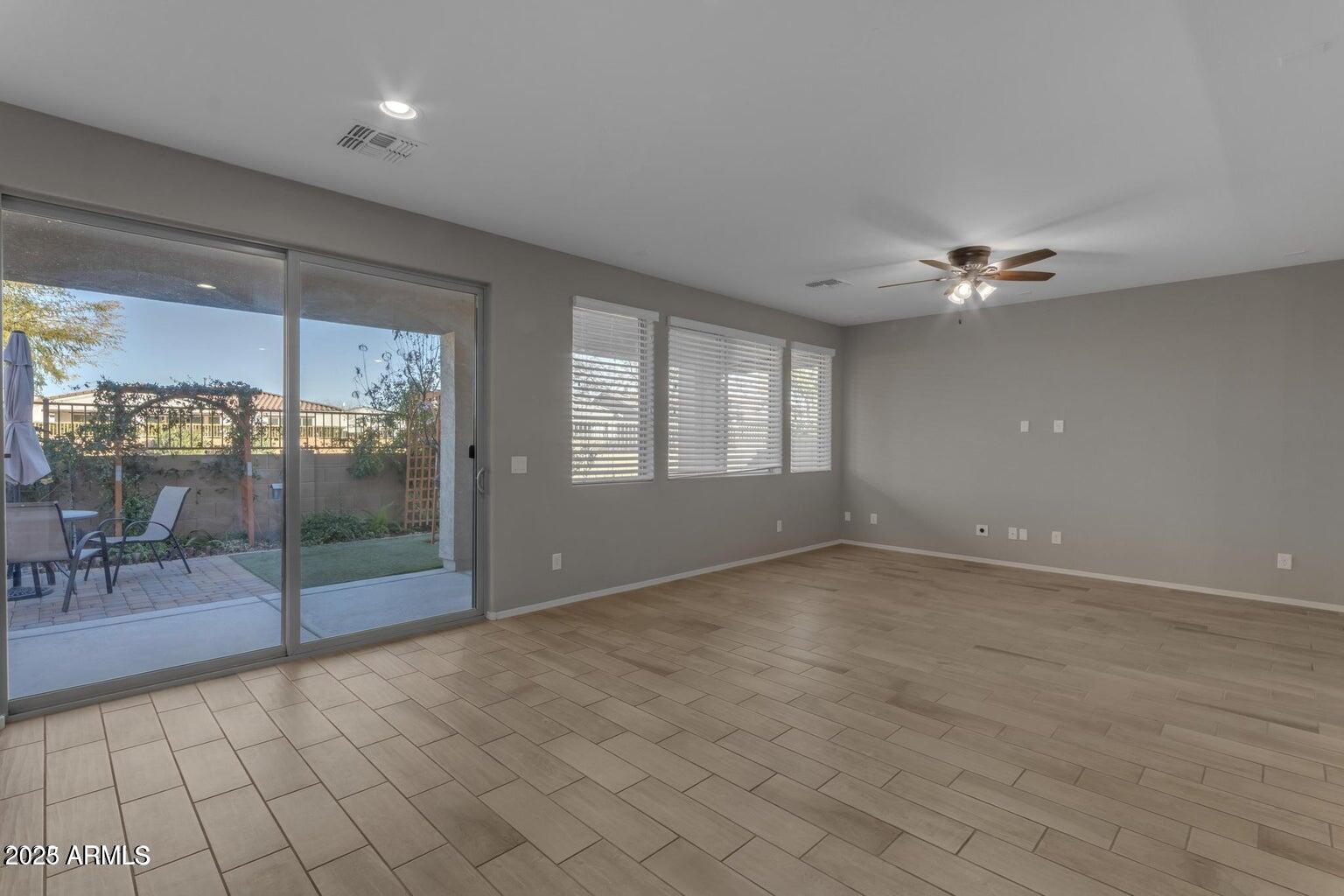 22841 South 225th Place Queen Creek, AZ 85142 - Photo 13 of 34 a view of an empty room with a window