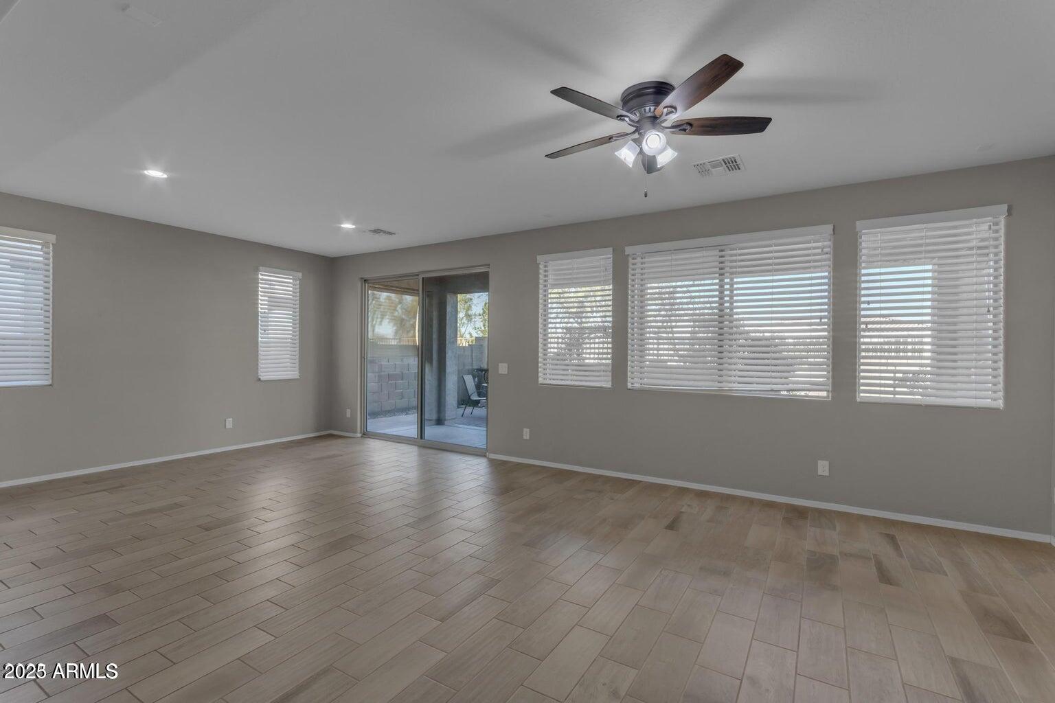 22841 South 225th Place Queen Creek, AZ 85142 - Photo 14 of 34 a view of an empty room with a window