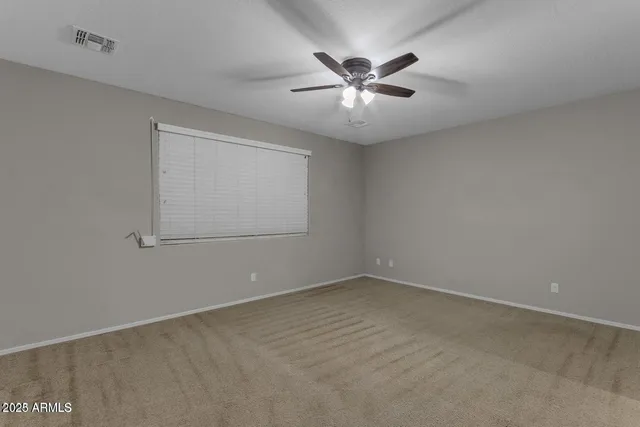 en empty room with windows