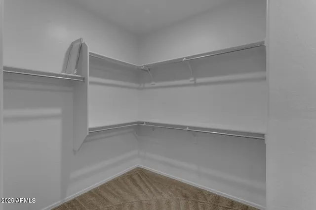 a empty closet with white paint