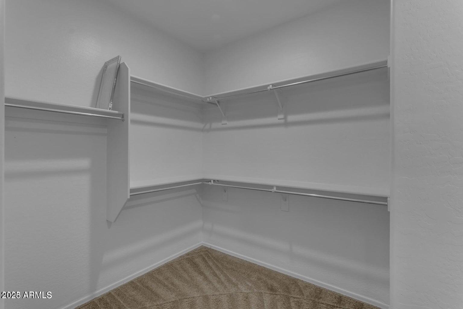 22841 South 225th Place Queen Creek, AZ 85142 - Photo 20 of 34 a empty closet with white paint