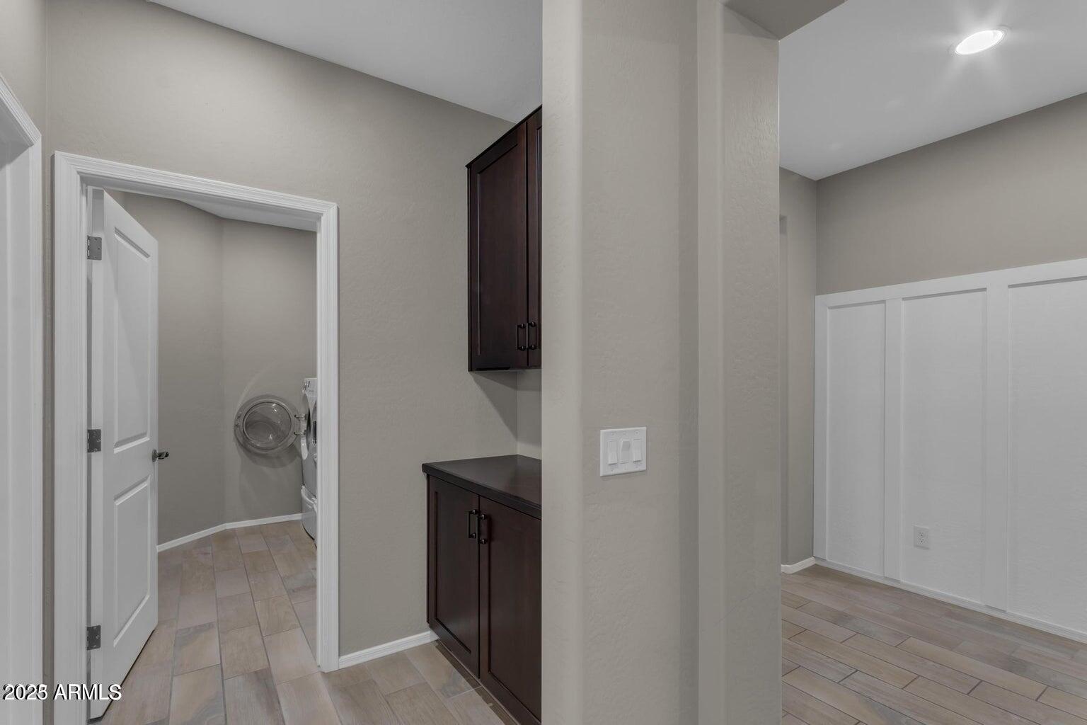 22841 South 225th Place Queen Creek, AZ 85142 - Photo 24 of 34 a view of a bathroom from a hallway