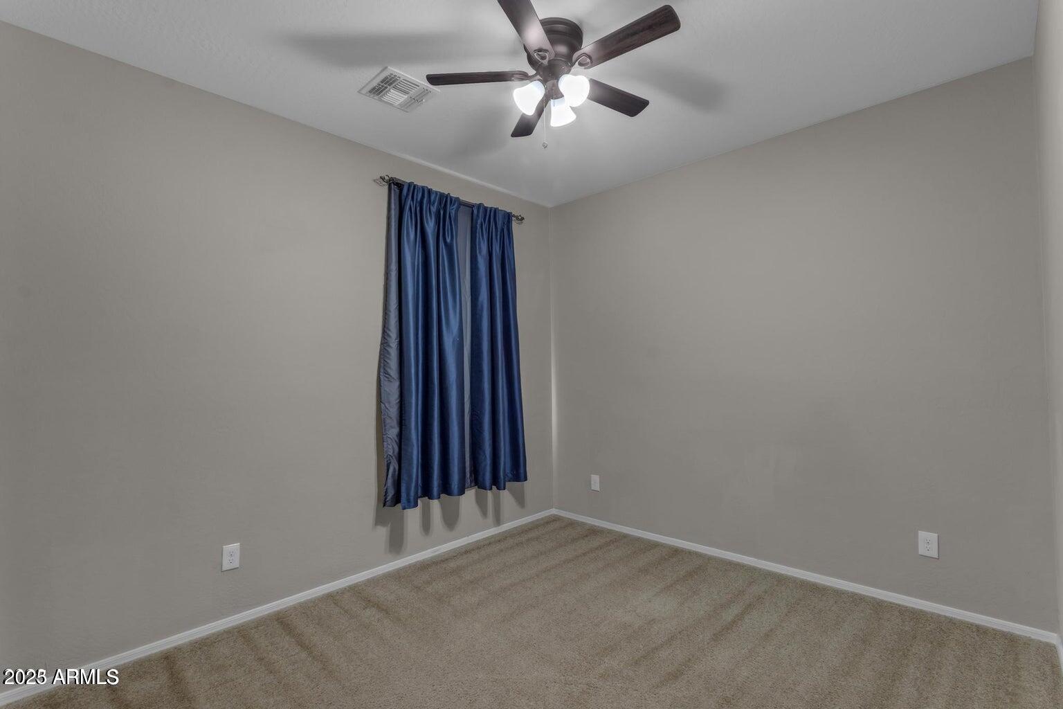 22841 South 225th Place Queen Creek, AZ 85142 - Photo 25 of 34 an empty room with closet and windows