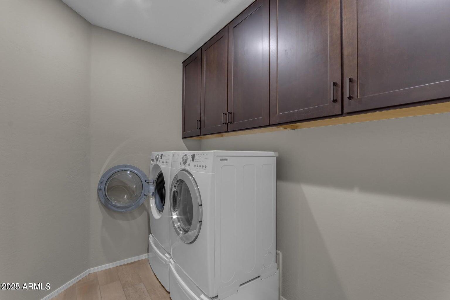 22841 South 225th Place Queen Creek, AZ 85142 - Photo 29 of 34 a utility room with dryer and washer