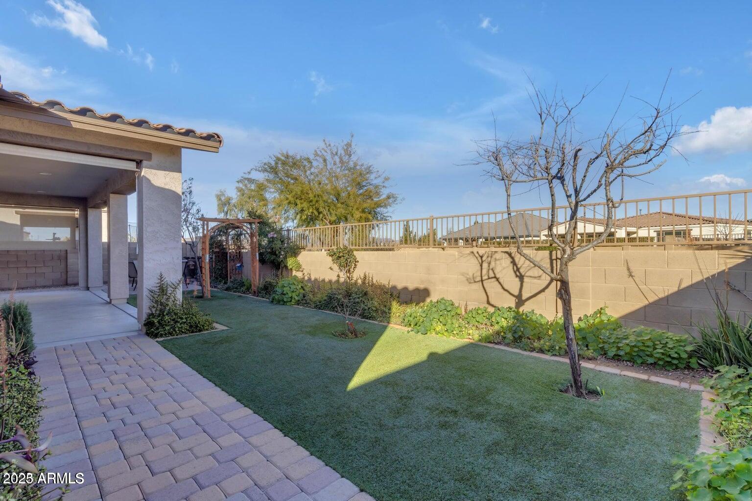 22841 South 225th Place Queen Creek, AZ 85142 - Photo 32 of 34 a view of a house with a yard