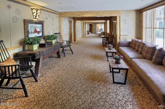 a kitchen with stainless steel appliances granite countertop a sink refrigerator and microwave