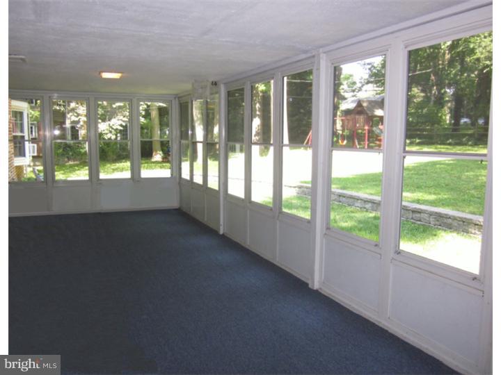 209 Pembroke Road Wallingford, PA 19086 - Photo 22 of 25 Sun Room