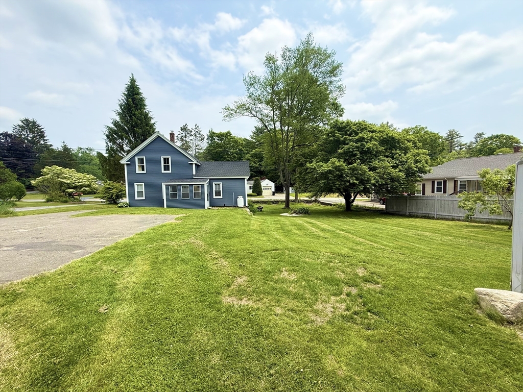 59 Brookfield Road Sturbridge, MA 01518 - Photo 12 of 40 a front view of a house with garden