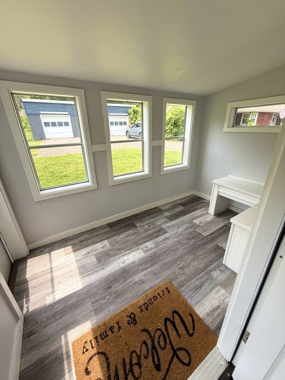 59 Brookfield Road Sturbridge, MA 01518 - Photo 16 of 40 a view of a living room with windows