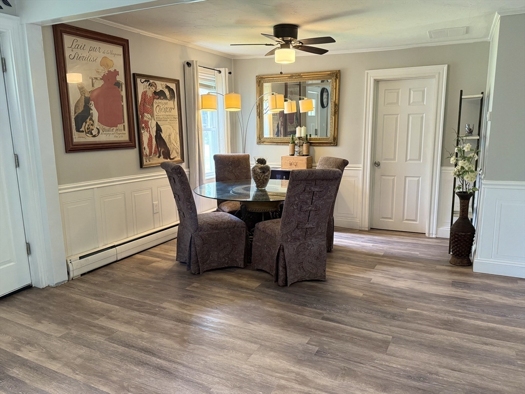 59 Brookfield Road Sturbridge, MA 01518 - Photo 17 of 40 a view of a dining room with furniture window and wooden floor