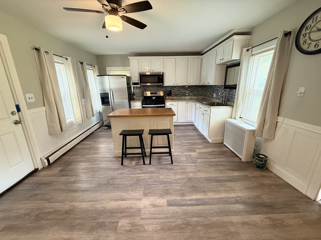 59 Brookfield Road Sturbridge, MA 01518 - Photo 20 of 40 a view of kitchen with sink microwave and refrigerator