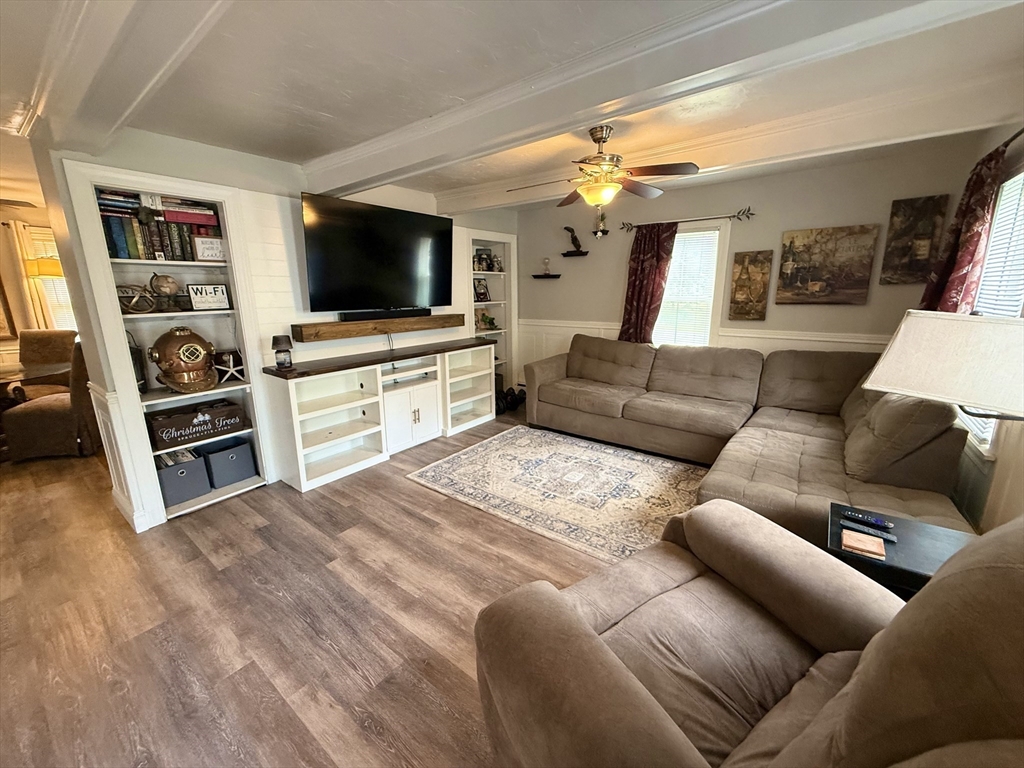 59 Brookfield Road Sturbridge, MA 01518 - Photo 21 of 40 a living room with furniture and a flat screen tv