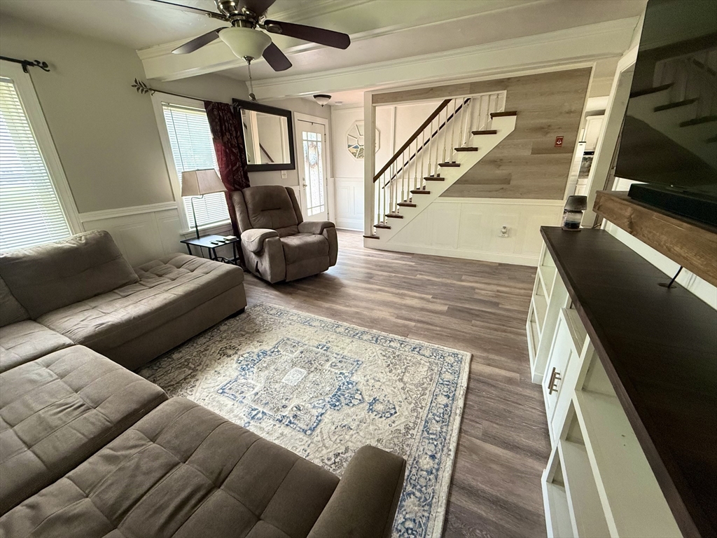 59 Brookfield Road Sturbridge, MA 01518 - Photo 22 of 40 a living room with furniture and a flat screen tv