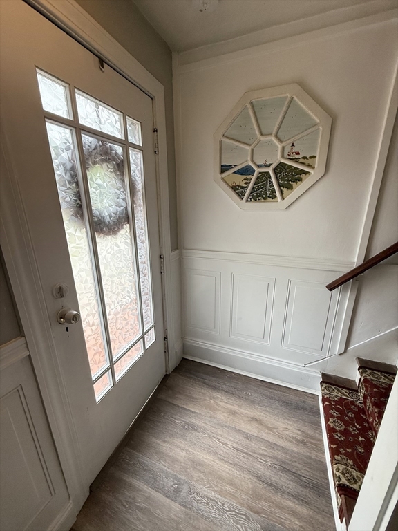 59 Brookfield Road Sturbridge, MA 01518 - Photo 26 of 40 a view of an empty room with wooden floor and a window