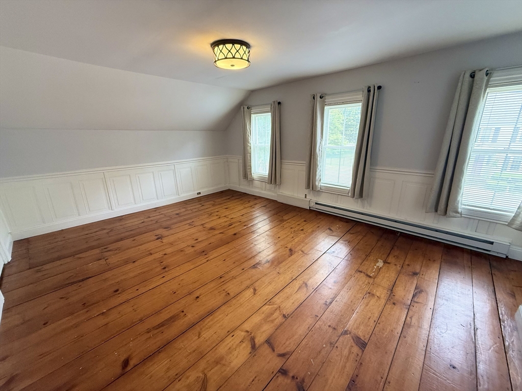 59 Brookfield Road Sturbridge, MA 01518 - Photo 31 of 40 a view of empty room with wooden floor and fan